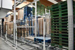 Read more about the article 鋼鐵與重工業專用：【重型自動化料架】的荷重安全與特殊夾具應用